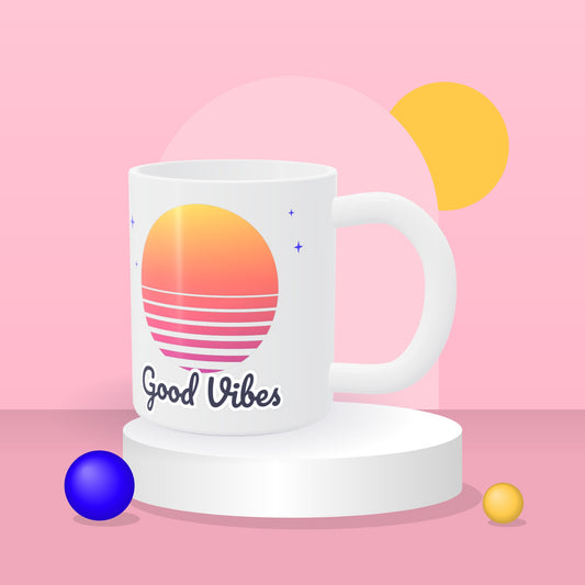 Personalized 11 oz white ceramic mug with a colourful Good Vibes sunset design on a pink studio backdrop